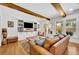 A cozy living room with built-in bookshelves, hardwood floors, and lots of natural light at 624 Richmond Street, Orlando, FL 32806