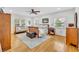Spacious main bedroom with hardwood floors, neutral colors, and ample natural light at 624 Richmond Street, Orlando, FL 32806
