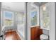 Well-lit bathroom showcasing walk-in shower, soaking tub, and toilet at 6501 Matchett Rd, Belle Isle, FL 32809