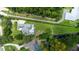 Overhead view of a private backyard, pool, and meticulously maintained landscaping on a sprawling lot at 6720 Winter Garden Vineland Rd, Windermere, FL 34786