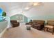 Spacious bonus room with comfortable seating, a TV, and plenty of natural light at 6720 Winter Garden Vineland Rd, Windermere, FL 34786