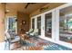 Cozy lanai with comfortable seating and views of the pool at 6720 Winter Garden Vineland Rd, Windermere, FL 34786
