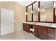 Bright primary bath featuring double sink vanity and plenty of cabinet storage at 6720 Winter Garden Vineland Rd, Windermere, FL 34786