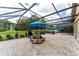 Screened patio with an outdoor picnic and lounge area and plenty of outdoor space at 6720 Winter Garden Vineland Rd, Windermere, FL 34786