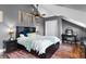 Cozy bedroom featuring a vaulted ceiling, stylish decor, and plush bedding for a relaxing retreat at 806 Spring Island Way, Orlando, FL 32828