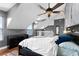 Unique loft bedroom features vaulted ceilings, a ceiling fan, and hardwood floors with great natural light at 806 Spring Island Way, Orlando, FL 32828