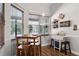 Bright breakfast nook with a small table, seating for four, and bright natural light at 806 Spring Island Way, Orlando, FL 32828