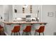 Kitchen bar with counter seating and modern lighting at 806 Spring Island Way, Orlando, FL 32828