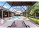 Outdoor lounge seating, screen in pool and jacuzzi perfect for entertaining or relaxation at 806 Spring Island Way, Orlando, FL 32828