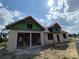 Exterior block construction showing zip system, roof and window openings during the building process at 9659 Midway Rd, Haines City, FL 33844