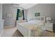 A calming bedroom with a window, light grey walls, and white furniture at 985 N Lake Claire Cir, Oviedo, FL 32765