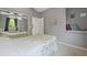 Serene bedroom featuring a window nook and a mirrored closet at 985 N Lake Claire Cir, Oviedo, FL 32765