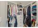 Organized walk-in closet with ample storage and shelving at 985 N Lake Claire Cir, Oviedo, FL 32765