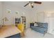Stylish office with bright lighting, colorful furniture, and shelving at 985 N Lake Claire Cir, Oviedo, FL 32765