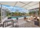 Beautiful pool and spa area enclosed with a screen, creating a serene outdoor oasis at 985 N Lake Claire Cir, Oviedo, FL 32765