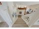 View from stairs of kitchen and dining area below at 985 N Lake Claire Cir, Oviedo, FL 32765