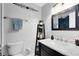 Clean half-bathroom with decorative shelving, new fixtures, and painted in a neutral tone at 102 Sand Pine Cir, Sanford, FL 32773