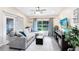 Cozy living room with natural light and backyard views at 102 Sand Pine Cir, Sanford, FL 32773