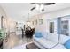 Open floor plan featuring a combined living and dining area with hardwood floors and natural light at 102 Sand Pine Cir, Sanford, FL 32773