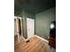 The neutral-toned bedroom features white trim and doors for a bright, inviting feel at 112 Avocado Ave, Sanford, FL 32771