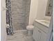 Bathroom featuring a glassed-in shower with an updated vanity at 13546 Summerton Dr, Orlando, FL 32824