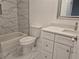Bathroom featuring a bathtub with updated vanity at 13546 Summerton Dr, Orlando, FL 32824