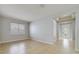 Living room with light tile flooring and natural light from a front-facing window at 13850 Amelia Pond Dr, Windermere, FL 34786