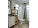 Bright bathroom featuring white tile, a modern vanity, and a shower-tub combo at 14147 Mailer Blvd, Orlando, FL 32828