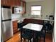 A modern kitchen featuring stainless steel appliances, eat in kitchen, and wooden cabinets at 14147 Mailer Blvd, Orlando, FL 32828