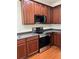 Stylish kitchen with stainless steel appliances, including a range and microwave at 14147 Mailer Blvd, Orlando, FL 32828