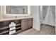 Bathroom featuring modern vanity with storage, and a walk-in shower at 14501 Grove Resort Ave # 3239, Winter Garden, FL 34787
