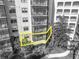 Beautiful view of the condo exterior highlighting the private balcony space, screened-in lanai, and lush landscaping at 14501 Grove Resort Ave # 3239, Winter Garden, FL 34787
