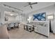Bright, open living space features modern decor, a neutral color palette and wood laminate flooring at 14501 Grove Resort Ave # 3239, Winter Garden, FL 34787