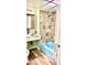 Bathroom featuring custom blue bathtub and modern tile work at 151 E Washington St # 508, Orlando, FL 32801