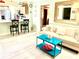 Bright living room featuring kitchen with breakfast bar and comfortable seating area at 151 E Washington St # 508, Orlando, FL 32801