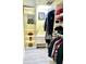 Organized walk-in closet with shelving, hanging racks, drawers, and attractive decor at 151 E Washington St # 508, Orlando, FL 32801