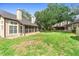 Private backyard with well-maintained lawn and mature trees at 1529 Farrindon Cir, Lake Mary, FL 32746