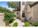 Picturesque courtyard featuring stone pavers, lush greenery, and a tranquil outdoor ambiance at 1529 Farrindon Cir, Lake Mary, FL 32746