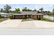 Charming single-Gathering home with a well-manicured lawn and a spacious driveway and two car garage at 1736 Saxon Blvd, Deltona, FL 32725