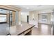 Bright kitchen showcasing views to the Florida room and the living spaces at 1736 Saxon Blvd, Deltona, FL 32725