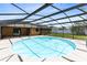 This stunning screened pool offers a serene retreat for relaxation and entertainment in your own backyard at 1736 Saxon Blvd, Deltona, FL 32725