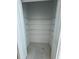 The inside of an organized, bright, and spacious closet with white shelving at 1754 35Th Nw St, Winter Haven, FL 33881