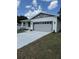 Charming single story home with a well manicured lawn and concrete driveway at 1754 35Th Nw St, Winter Haven, FL 33881