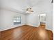 Bright, spacious bedroom with wood flooring and a view to the outdoors at 1818 Portview Ave, Deltona, FL 32738