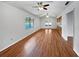 Bright open living area with hardwood floors and access to the pool at 1818 Portview Ave, Deltona, FL 32738