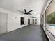 Covered patio with ceiling fans and view of swimming pool at 1818 Portview Ave, Deltona, FL 32738