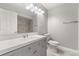 Tastefully updated bathroom with modern vanity, and tiled shower and toilet at 1924 Lake Atriums Cir # 52, Orlando, FL 32839