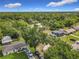 A cozy neighborhood with charming homes, lush greenery, and a serene atmosphere at 219 E Fern Dr, Orange City, FL 32763