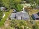 Charming single-story home with palm trees, fenced yard and above ground pool at 219 E Fern Dr, Orange City, FL 32763