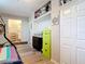 Bedroom features built-in storage, bunk beds, and laminate wood floors at 219 E Fern Dr, Orange City, FL 32763